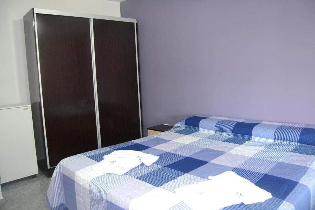 Cama o camas de una habitación en Cabañas AbuelaPaula