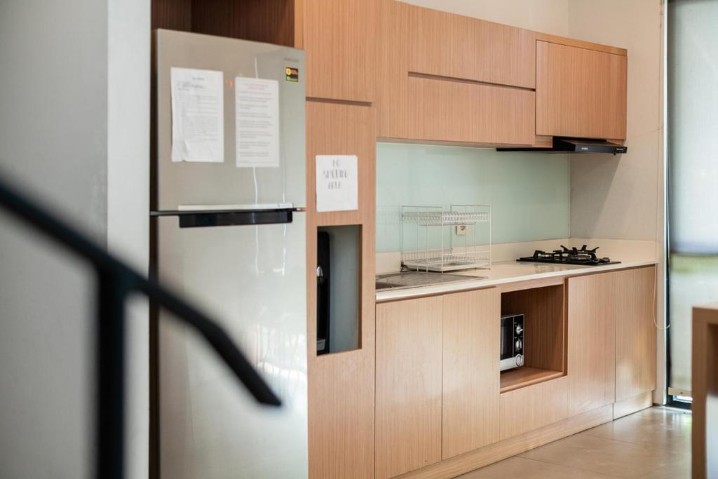 Kuchyň nebo kuchyňský kout v ubytování Three J Residence 2