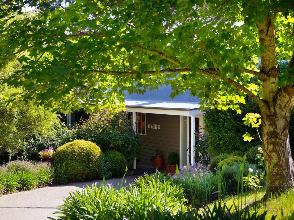 a house with a garden in front of it at Haiku in Daylesford