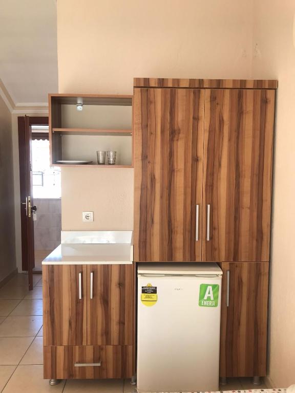 Kuchyň nebo kuchyňský kout v ubytování UnSide Apart Otel