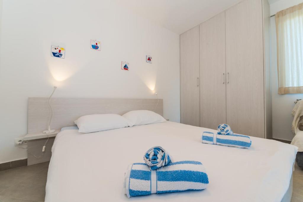 Posteľ alebo postele v izbe v ubytovaní Apartments Keran