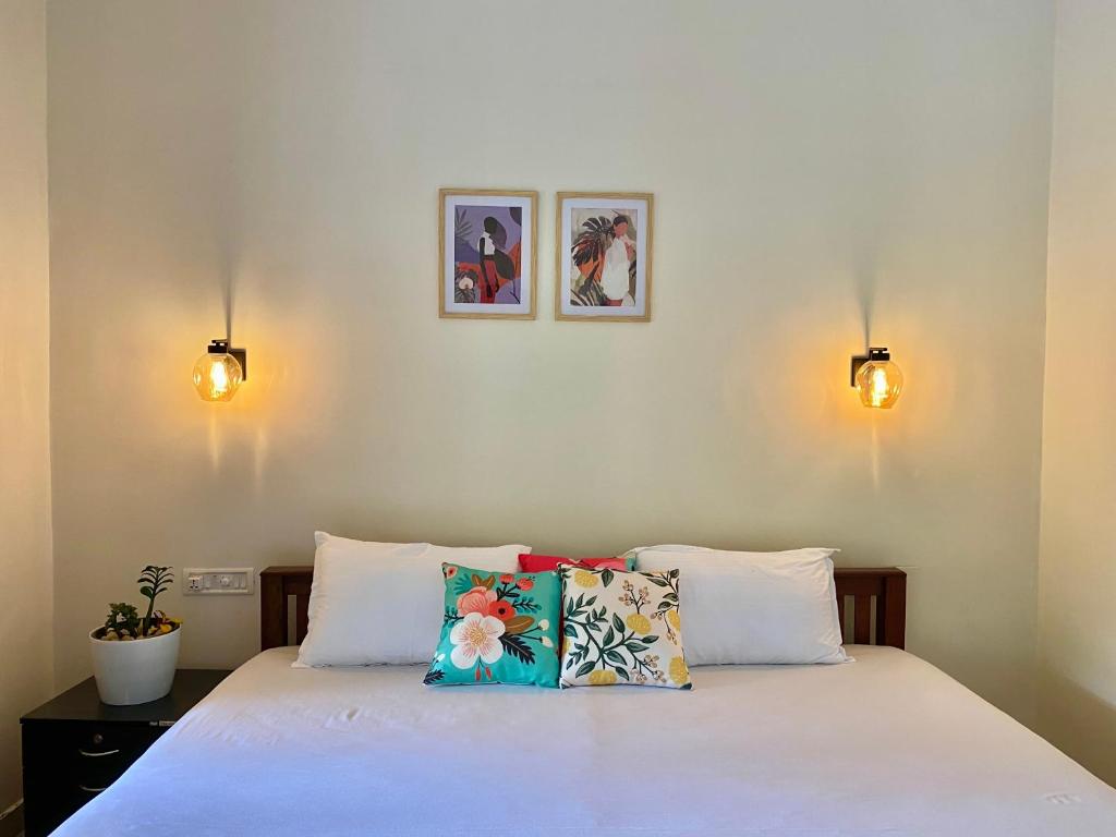 Letto o letti in una camera di Flower Valley Plantation Homestay