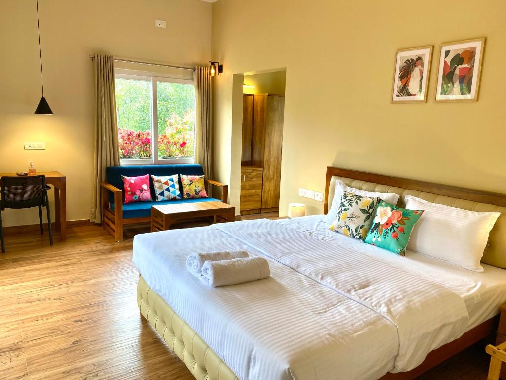 Letto o letti in una camera di Flower Valley Plantation Homestay
