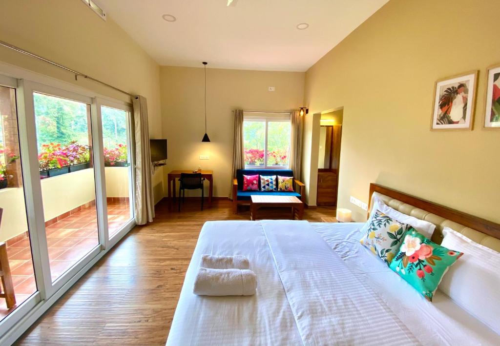 Letto o letti in una camera di Flower Valley Plantation Homestay