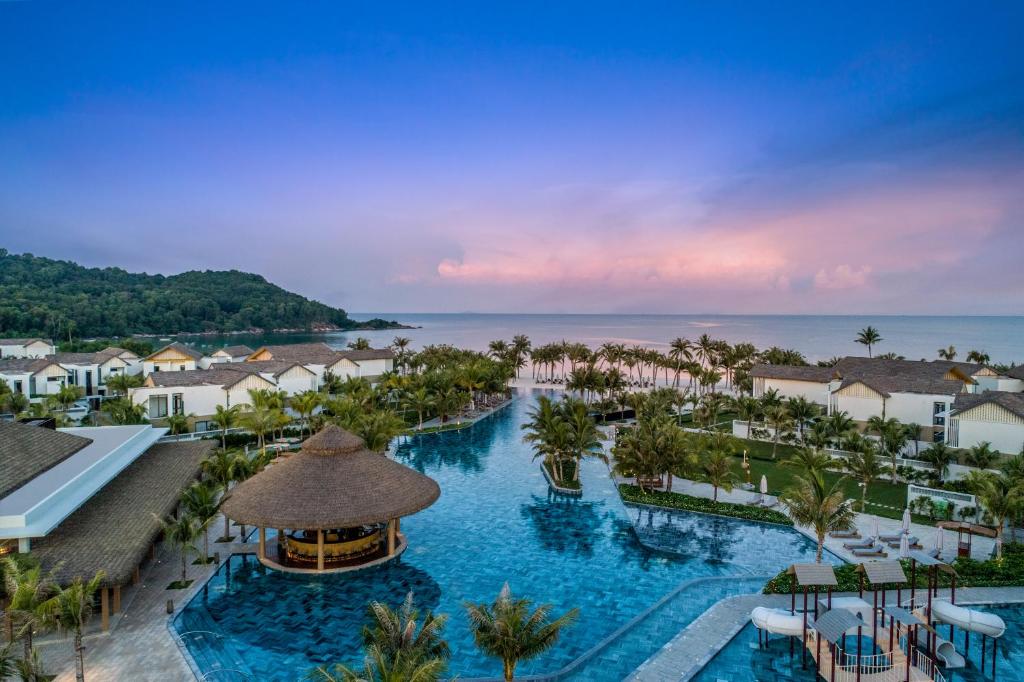 an aerial view of a resort with a pool at New World Phu Quoc Resort in Phú Quốc