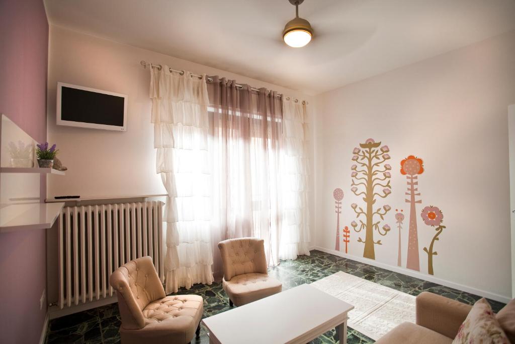 A television and/or entertainment centre at SUITE MORGANA in San Zeno