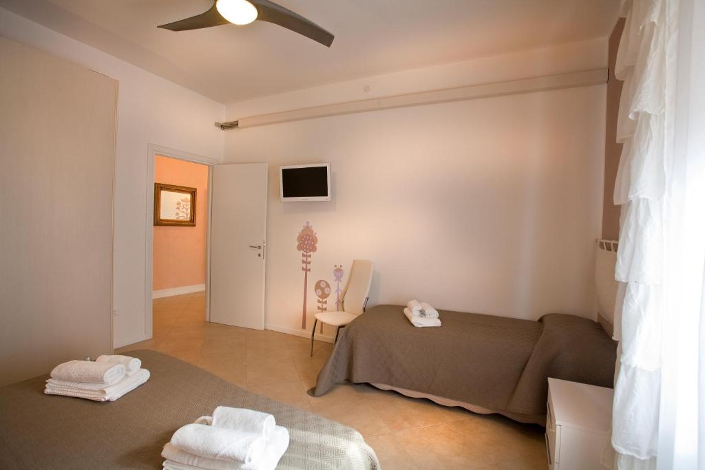 A television and/or entertainment centre at SUITE MORGANA in San Zeno