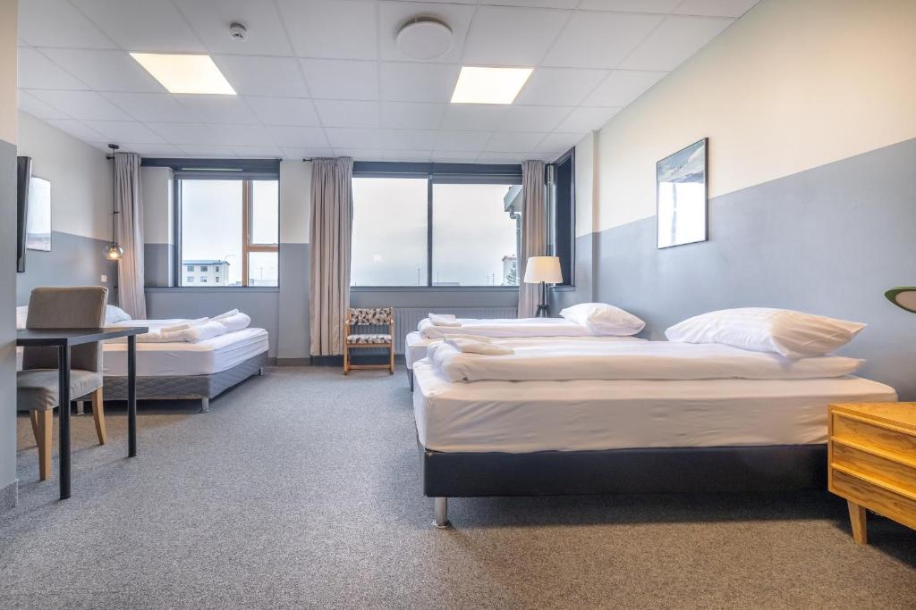 Rúm í herbergi á ABC Hotel by Reykjavik Keflavik Airport