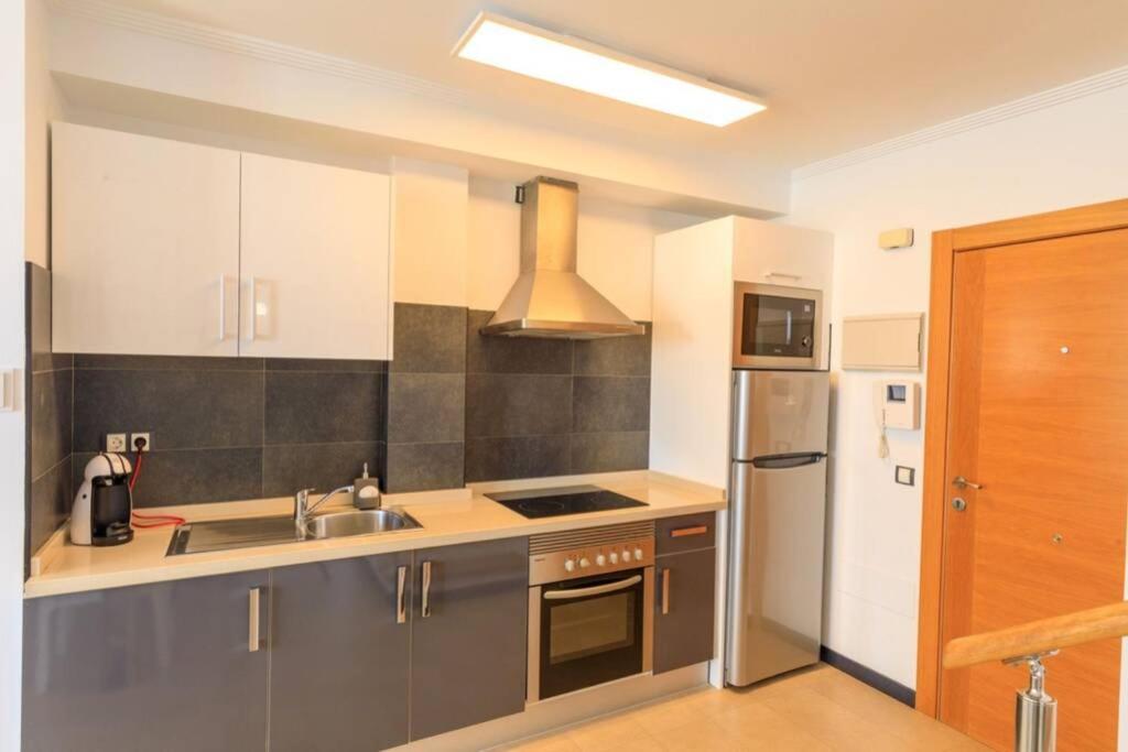 Kuchyň nebo kuchyňský kout v ubytování BRUNO'S HOME