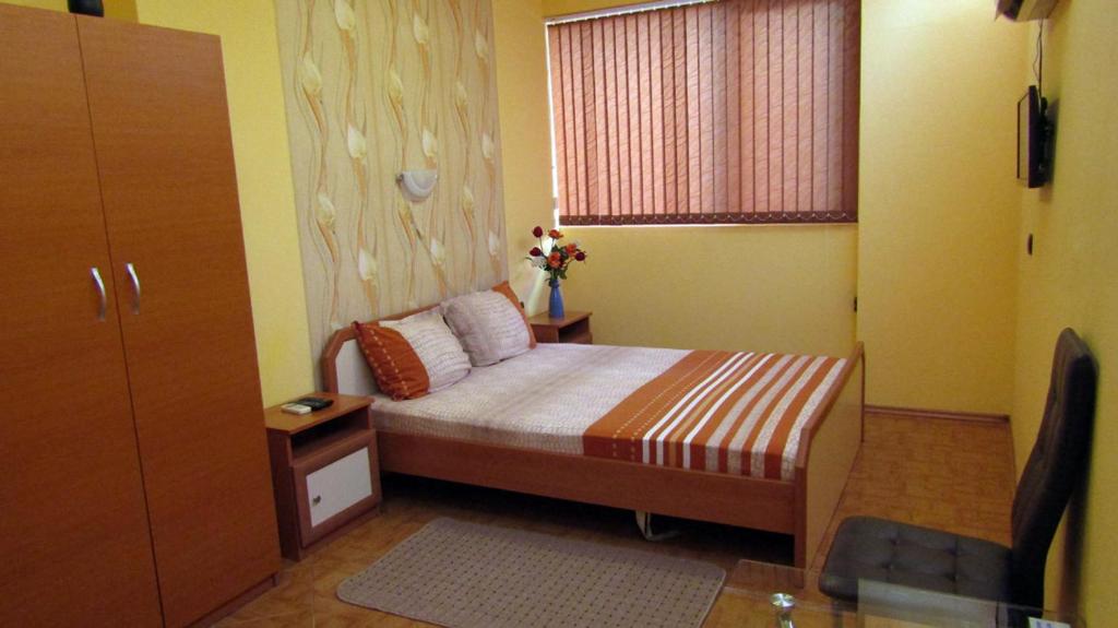 En eller flere senge i et værelse på Стаи за нощувки "Азалия"