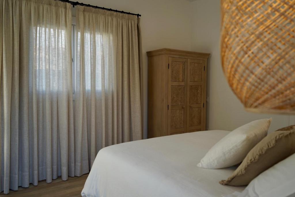 Postel nebo postele na pokoji v ubytování Siempre Feliz La Casita Escanfraga
