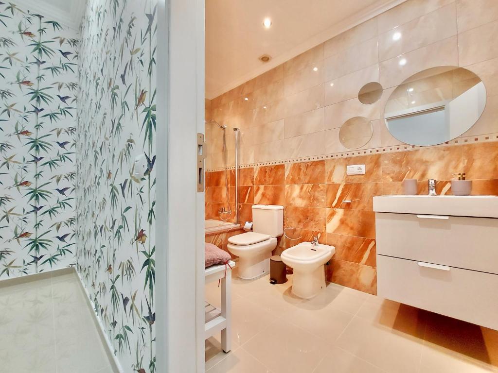 Kúpeľňa v ubytovaní Aromas Suites Apartments