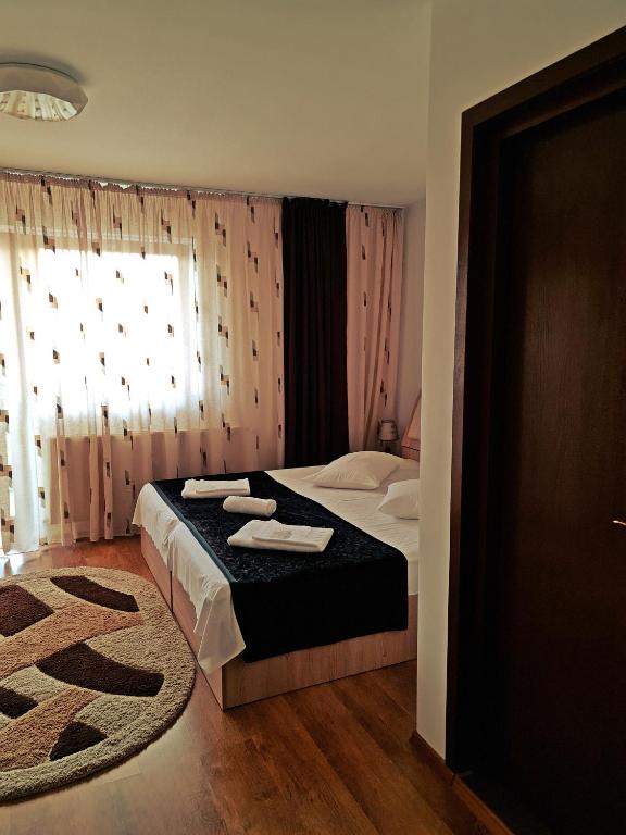 Postel nebo postele na pokoji v ubytování Casa Leu