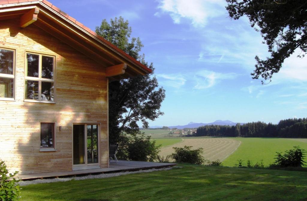 a house with a view of a field at Ferienhaus Eller in Traunwalchen