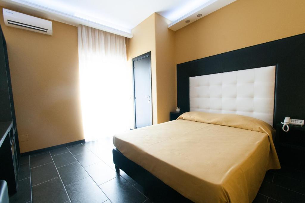 Posteľ alebo postele v izbe v ubytovaní Fly Boutique Hotel