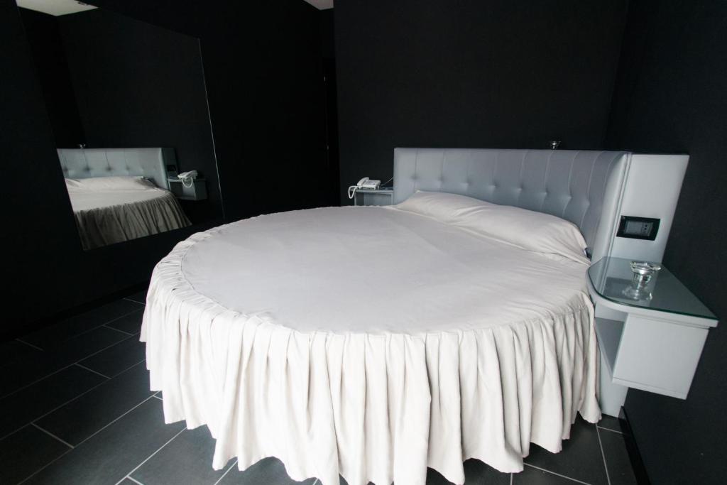 Posteľ alebo postele v izbe v ubytovaní Fly Boutique Hotel