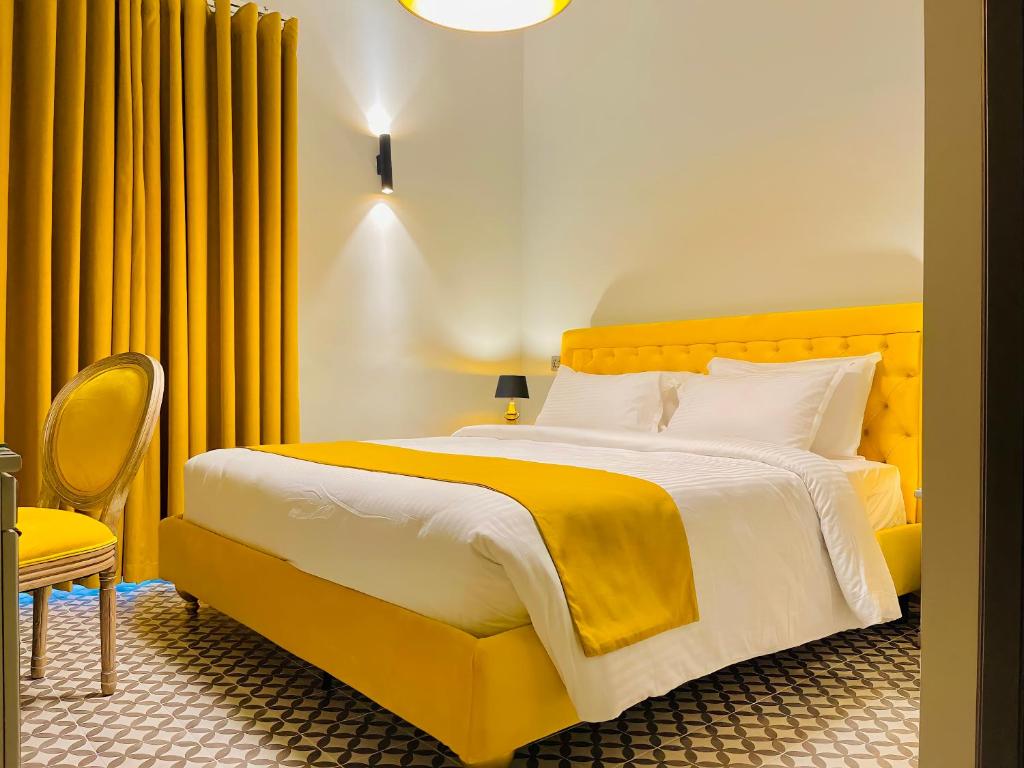 Postel nebo postele na pokoji v ubytování Casa Reale Boutique Hotel