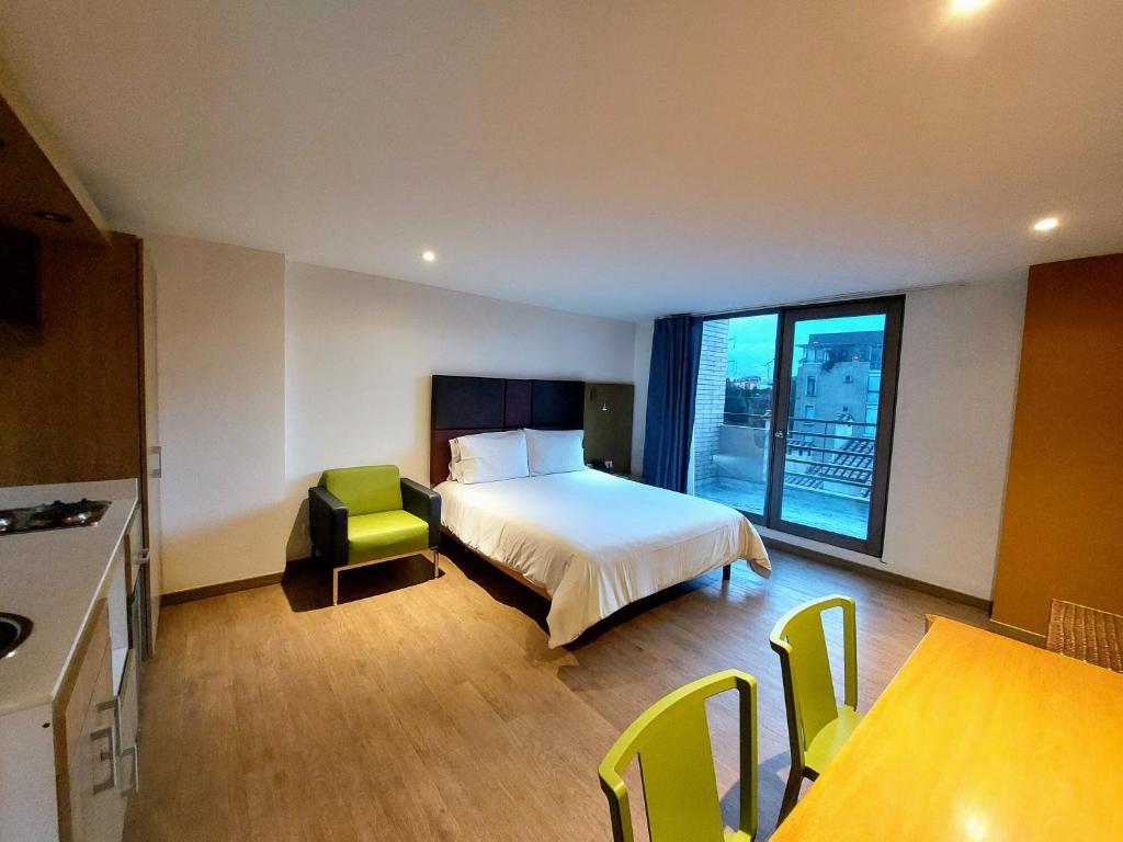 Postel nebo postele na pokoji v ubytování Hotel Viaggio Teleport City Suites