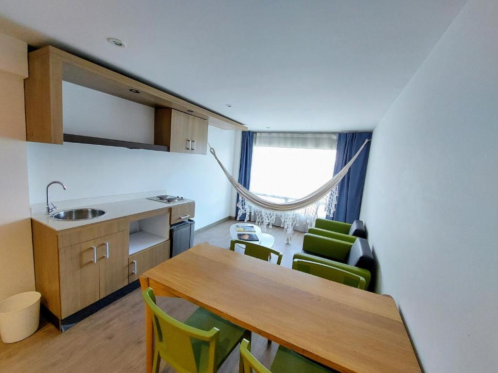 Kuchyň nebo kuchyňský kout v ubytování Hotel Viaggio Teleport City Suites
