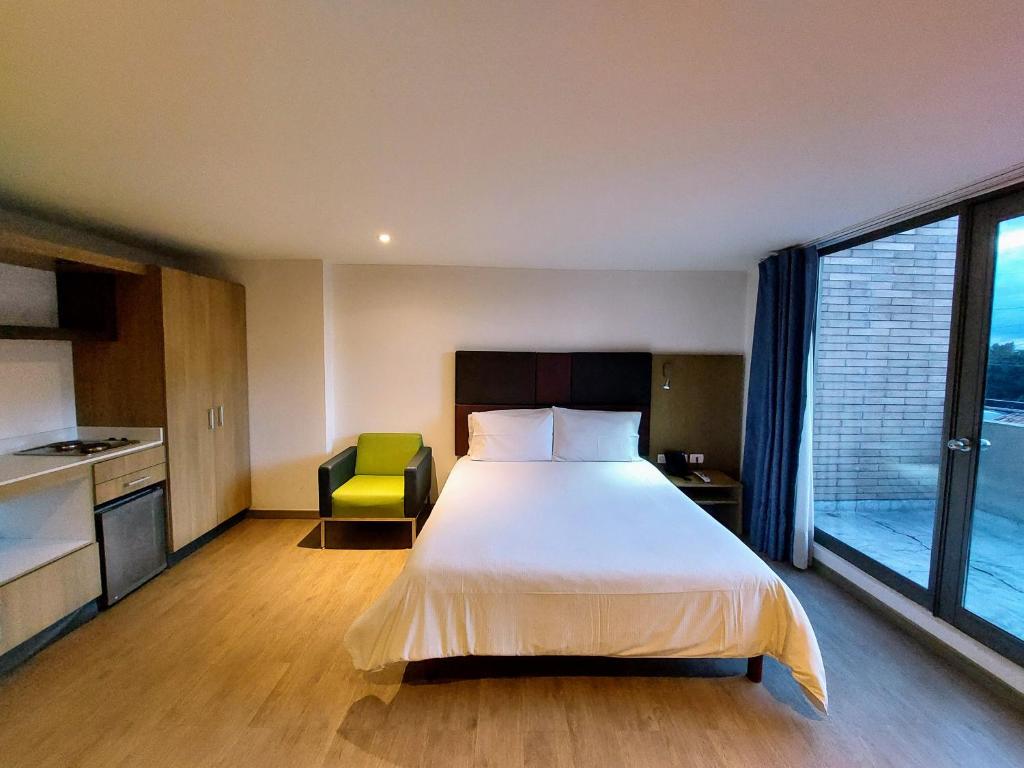 Postel nebo postele na pokoji v ubytování Hotel Viaggio Teleport City Suites
