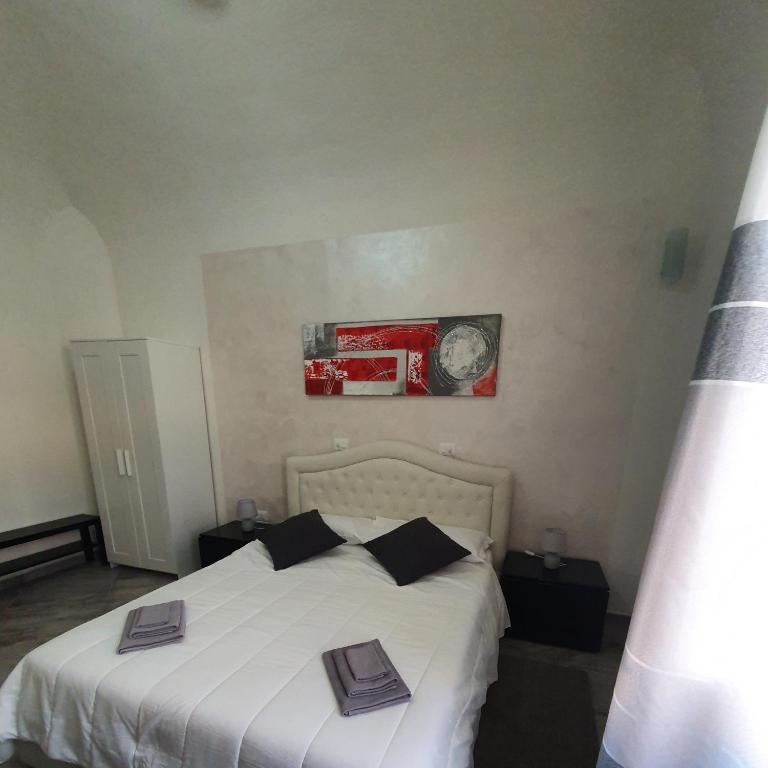 Postel nebo postele na pokoji v ubytování rooms cris