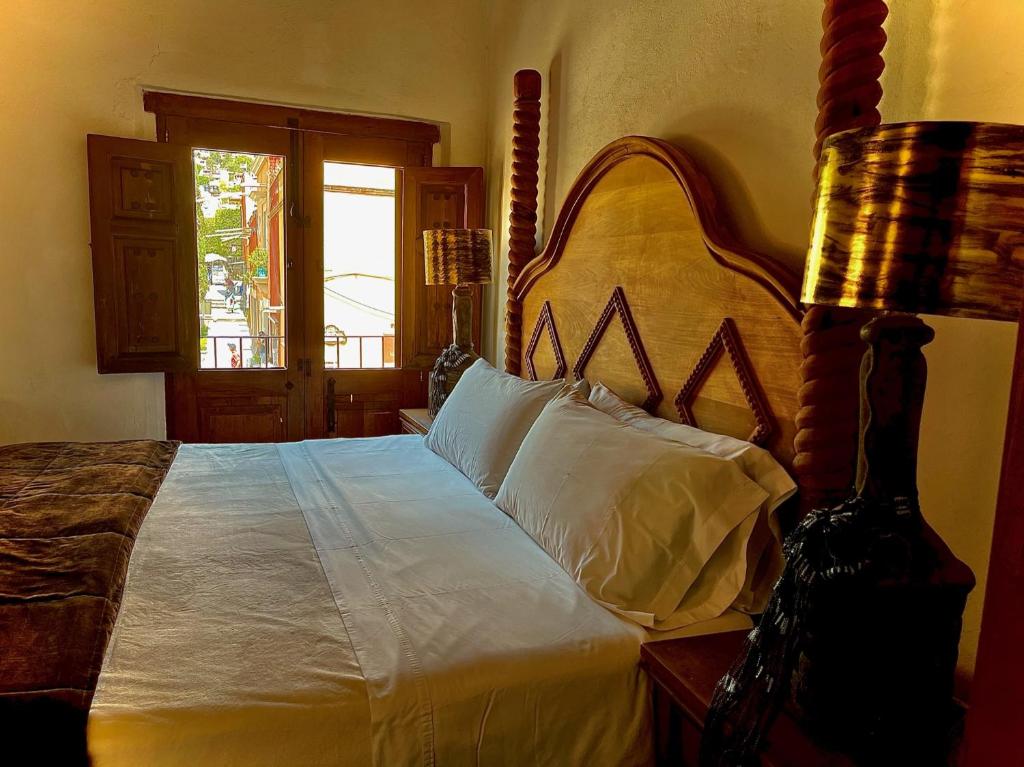 Postel nebo postele na pokoji v ubytování Hotel Casa Oratorio "Adults Only"