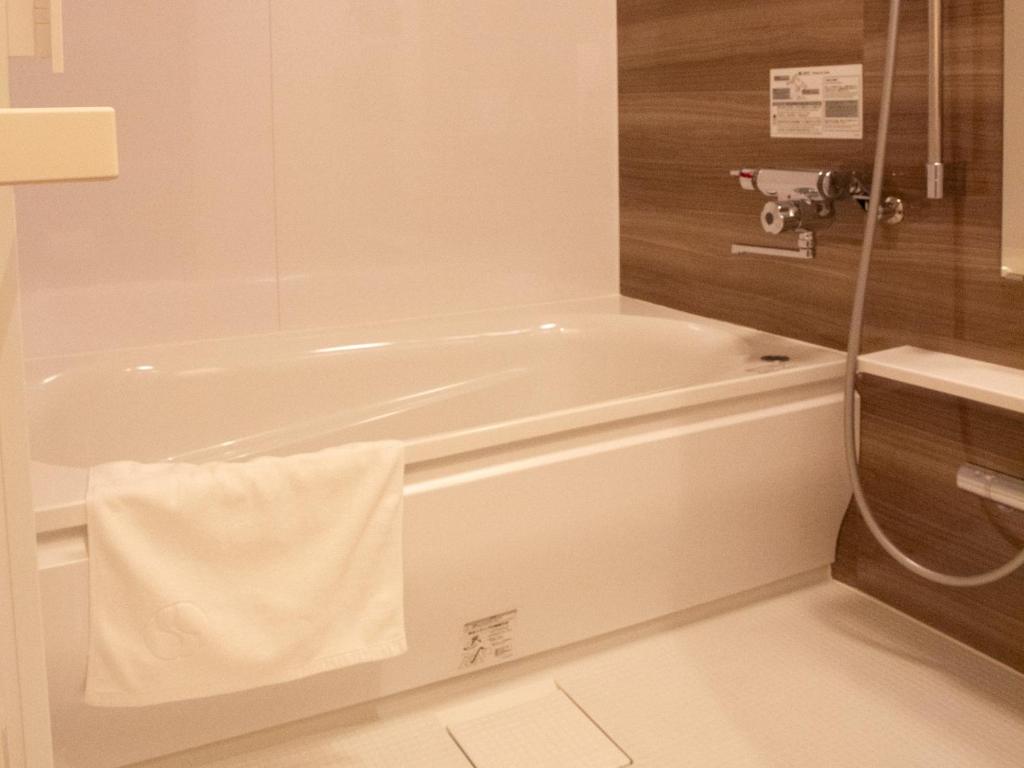 Koupelna v ubytování Hotel Rakurakuan