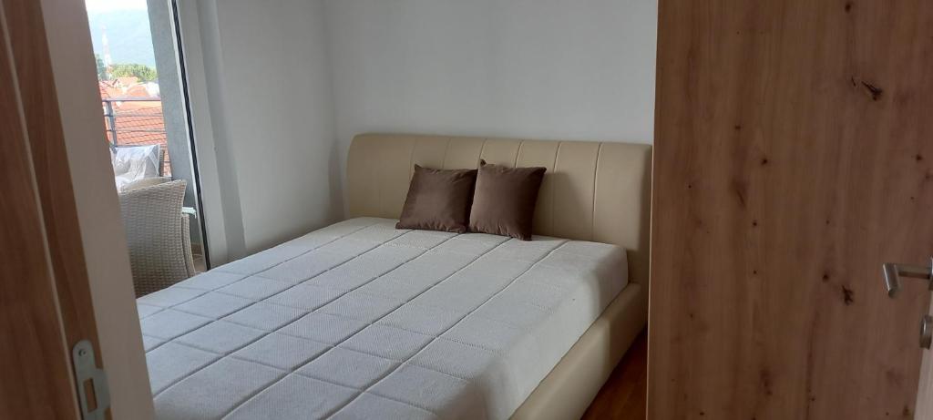 Postel nebo postele na pokoji v ubytování Apartman Ramonda Vrnjacka banja
