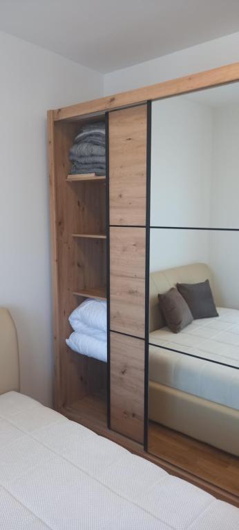 Postel nebo postele na pokoji v ubytování Apartman Ramonda Vrnjacka banja
