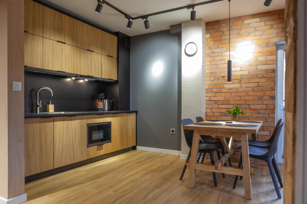 Kuchyňa alebo kuchynka v ubytovaní Apartament City Center Modern Loft 6 - bezpłatny parking