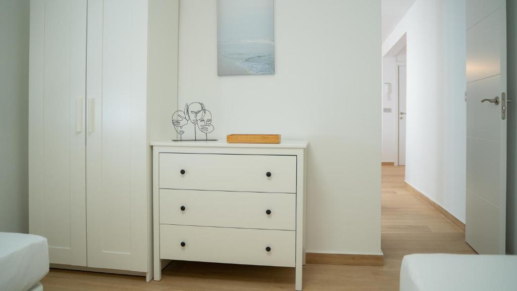 Postel nebo postele na pokoji v ubytování APARTAMENTO JUNTO A LA PLAYA DE BENIDORM
