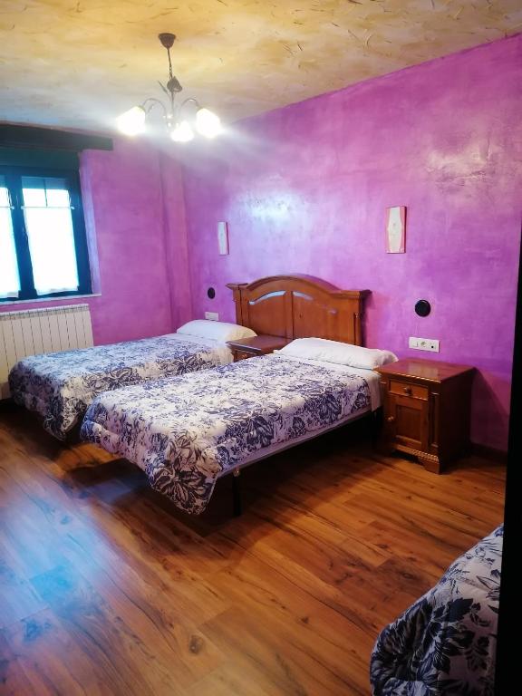 Postel nebo postele na pokoji v ubytování Hostería Casa Flor