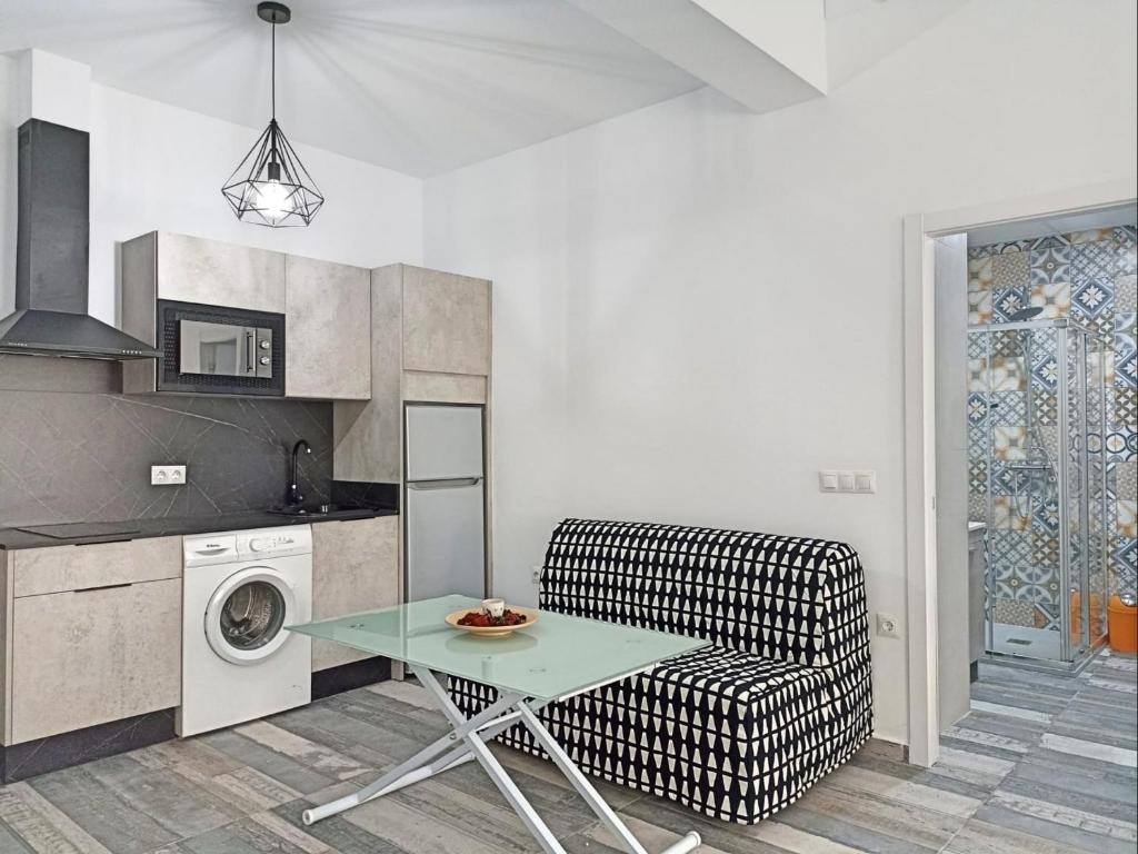 Kuchyň nebo kuchyňský kout v ubytování Modernos Apartamentos en Ciudad Jardín Córdoba