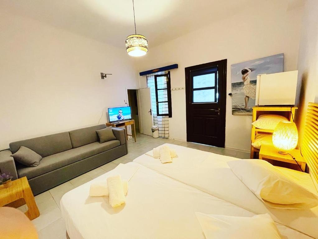Postel nebo postele na pokoji v ubytování Hotel Albatross