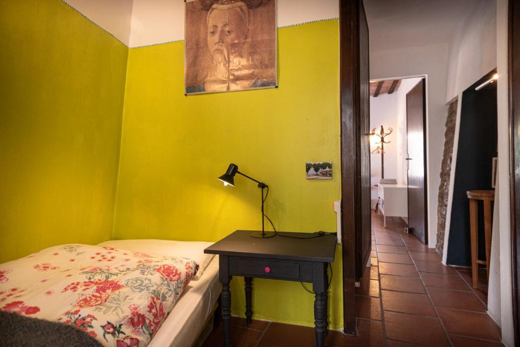 A bed or beds in a room at Da Giorgio