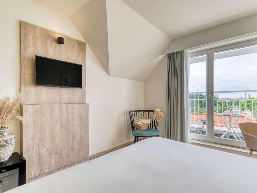 TV a/nebo společenská místnost v ubytování ibis Styles Nieuwpoort