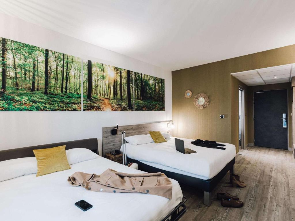 Postel nebo postele na pokoji v ubytování ibis Styles Contres-Cheverny