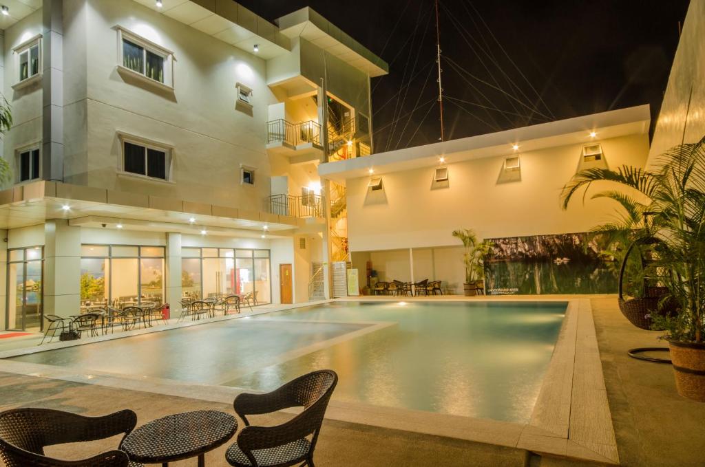 Bazén v ubytování Palawan Uno Hotel nebo v jeho okolí