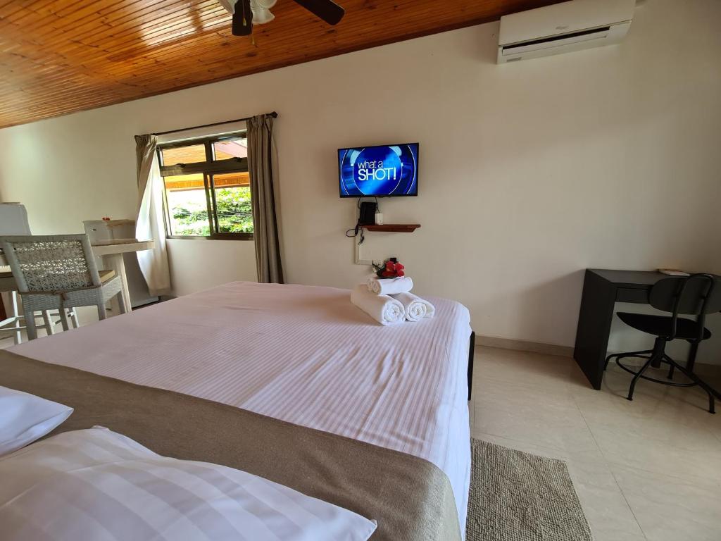 Postel nebo postele na pokoji v ubytování Tourterelle Holiday Home