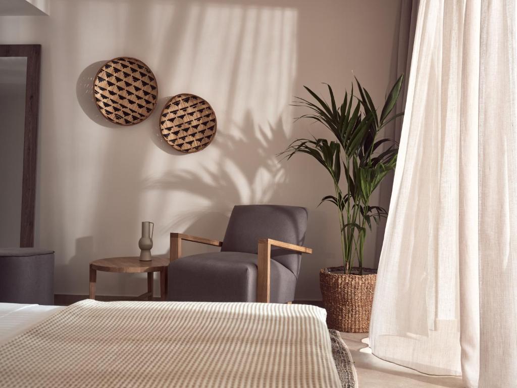 A seating area at Uparati villa - Hilltop Sea View Retreat