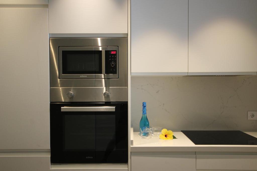 A kitchen or kitchenette at Apartment Azahara Sunrises, Los Cristianos