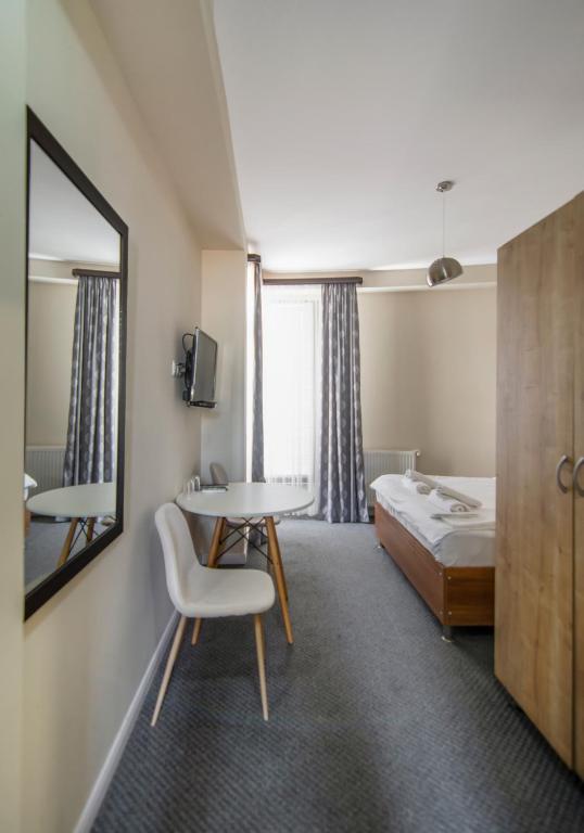 Postel nebo postele na pokoji v ubytování Hotel "Elesa Wera"