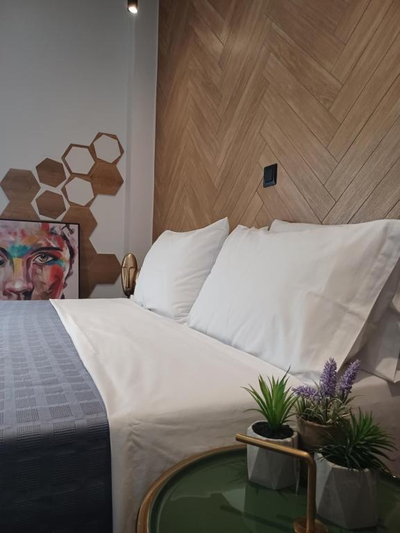 Postel nebo postele na pokoji v ubytování Sroom Apartment