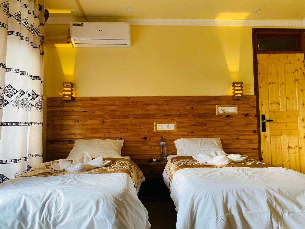 Postel nebo postele na pokoji v ubytování Mariana Maldives