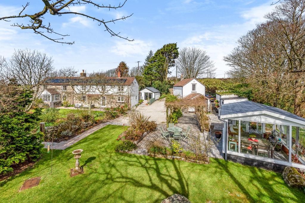 an aerial view of a house with a garden at Tresowes Green Cottage in Helston