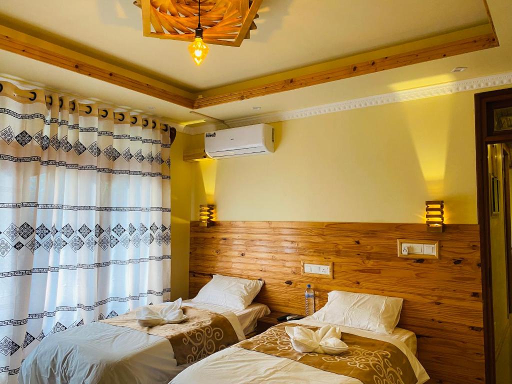 Postel nebo postele na pokoji v ubytování Mariana Maldives