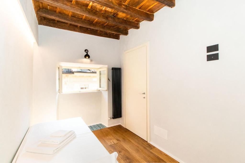Posteľ alebo postele v izbe v ubytovaní Stylish Quardilatero Romano Central Flat