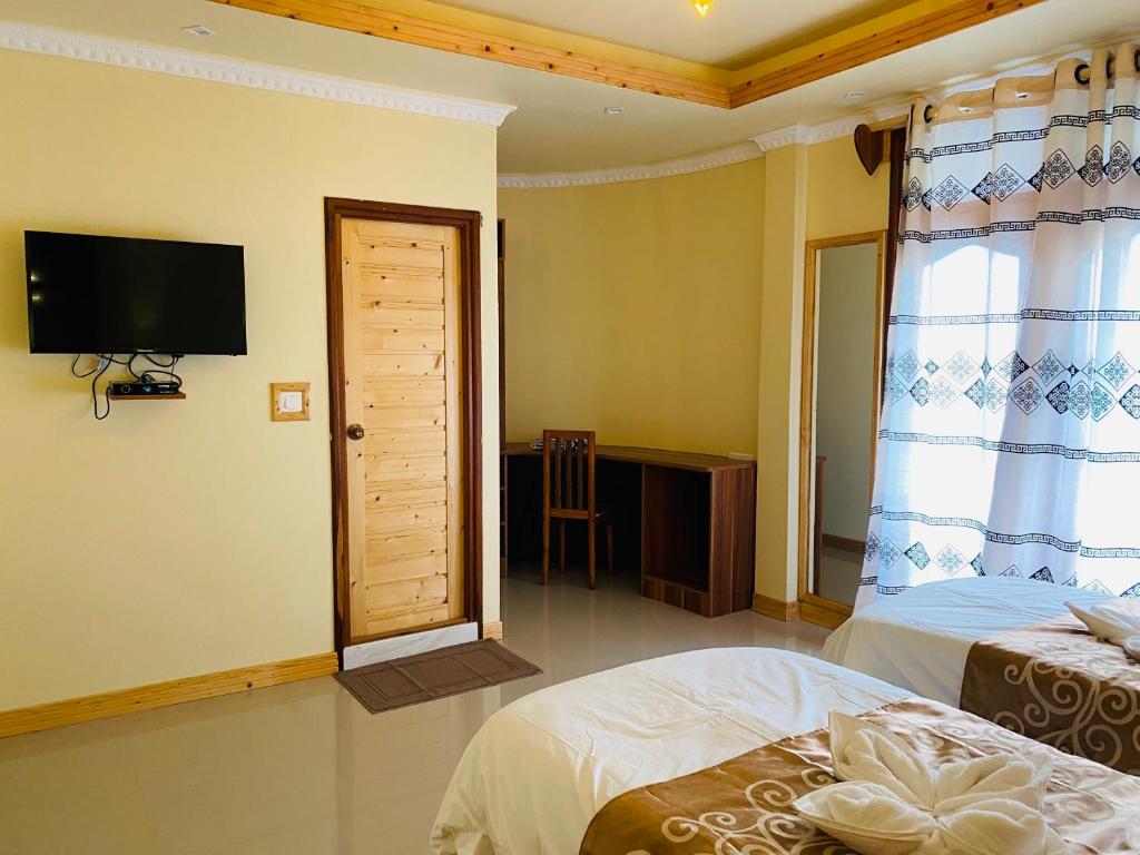 TV a/nebo společenská místnost v ubytování Mariana Maldives