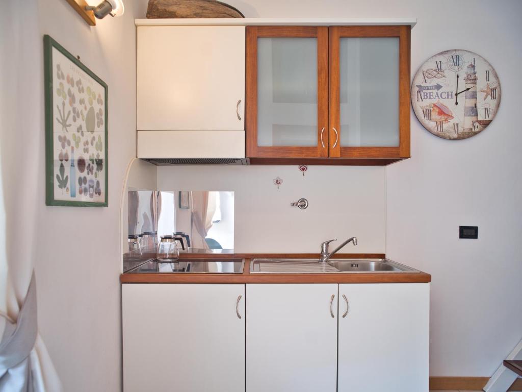 Kuchyňa alebo kuchynka v ubytovaní Medusa Apartment - Monolocale Centro