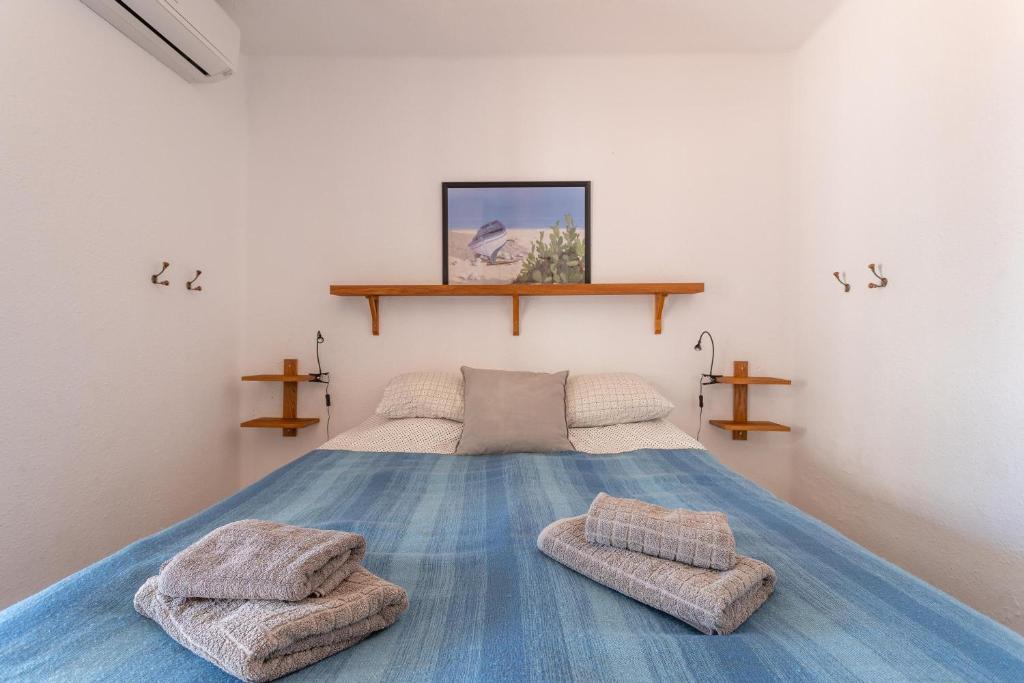 Posteľ alebo postele v izbe v ubytovaní Capistrano Playa